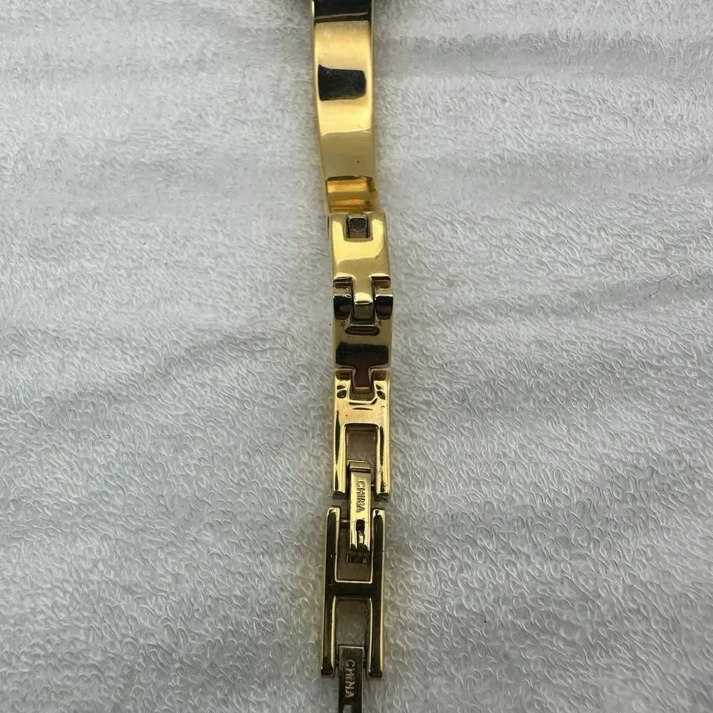 Peugeot Gold Tone Quartz Watch – Mother-of-Pearl Face